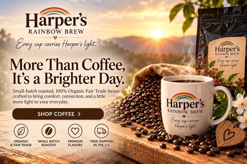 Harper's Rainbow Brew: More Than Coffee, It's a Brighter Day. Small-batch roasted, 100% organic fair trade coffee at sunrise with a steaming mug and coffee beans.
